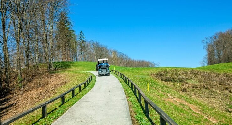 golf truck riding through path golf course otocec slovenia 181624 144051 e1748912089370