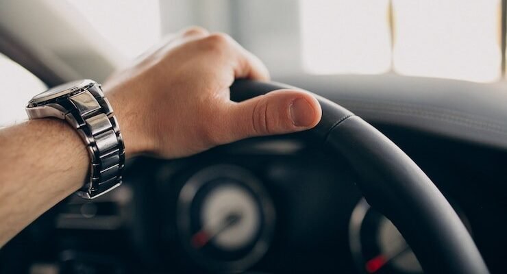 handsome man sitting car testing it 1303 218061 e1748883418853